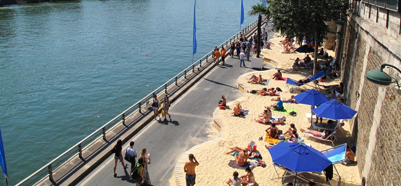 Image: Beach in Paris in summer. (Photo via Ken Eckert / Wikimedia Commons)