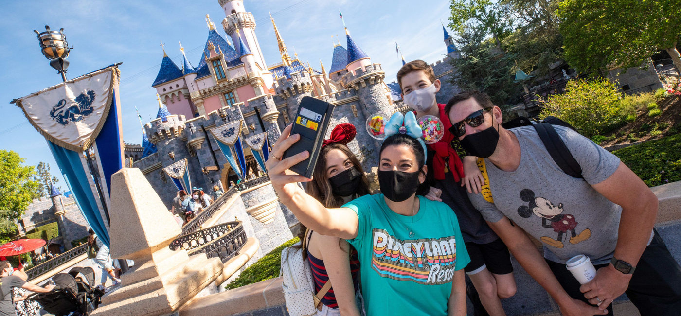 Image: Guests in front of Sleeping Beauty's Castle at Disneyland Park. (photo courtesy of Disneyland Resort)