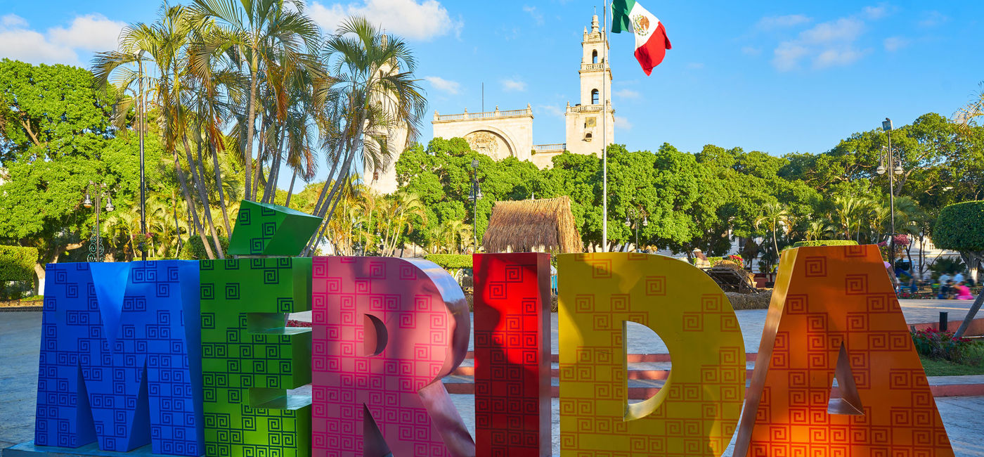 Image: Sign in the historic Yucatán State capital city of Mérida, Mexico. (photo via iStock/Getty Images Plus/LUNAMARINA)