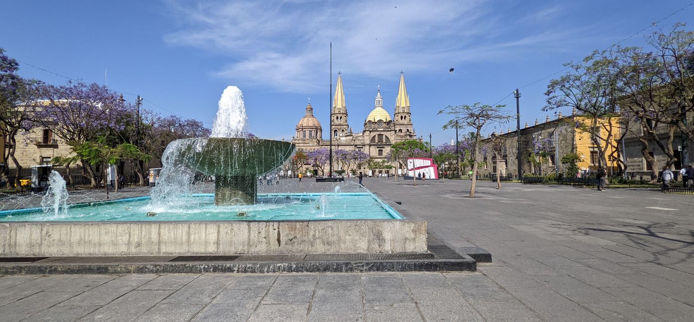 Image: Life centers around the plazas of Guadalajara which often have lovely fountains, greenery, and historic churches. (photo by Alex Temblador)