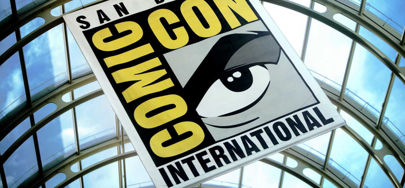 Image: The Comic-Con International official logo on display at the San Diego Convention Center. (Photo via Flickr / Gage Skidmore)