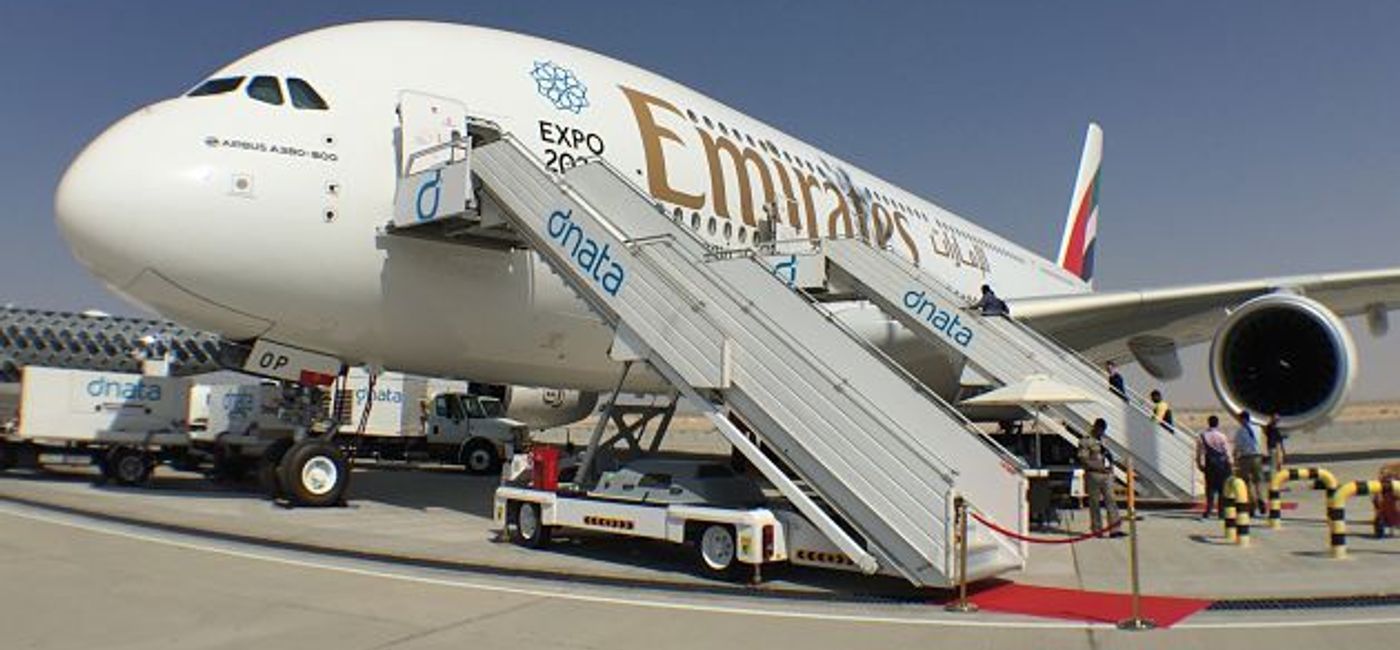 Image: PHOTO: An Emirates Jet set to receive passengers. (photo by Paul Thompson)