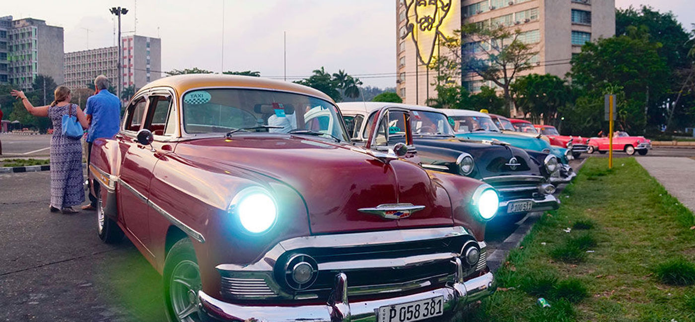 Image: PHOTO: A 1953 Chevrolet Bel Air leads a caravan of classic cars at Revolution Square in Havana, Cuba. (photo by Jason Leppert)