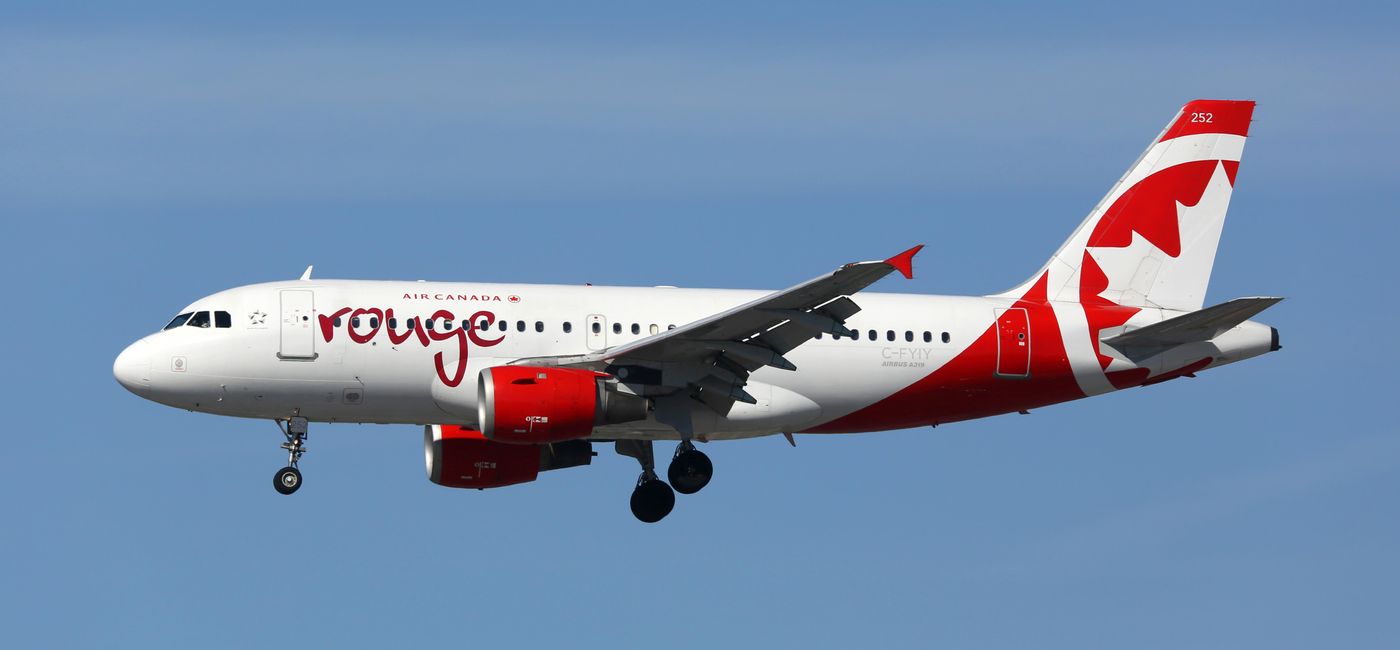 Image: PHOTO: An Air Canada Rouge Airbus A319 landing at LAX. (photo via Boarding1Now/iStock Editorial/Getty Images Plus)