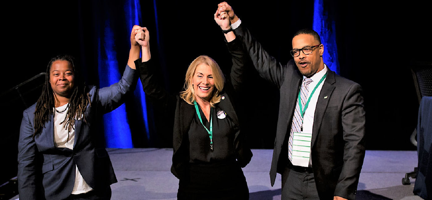 Image: Sara Nelson, center, has been re-elected as the international president of the flight attendants union. (Photo by AFA)