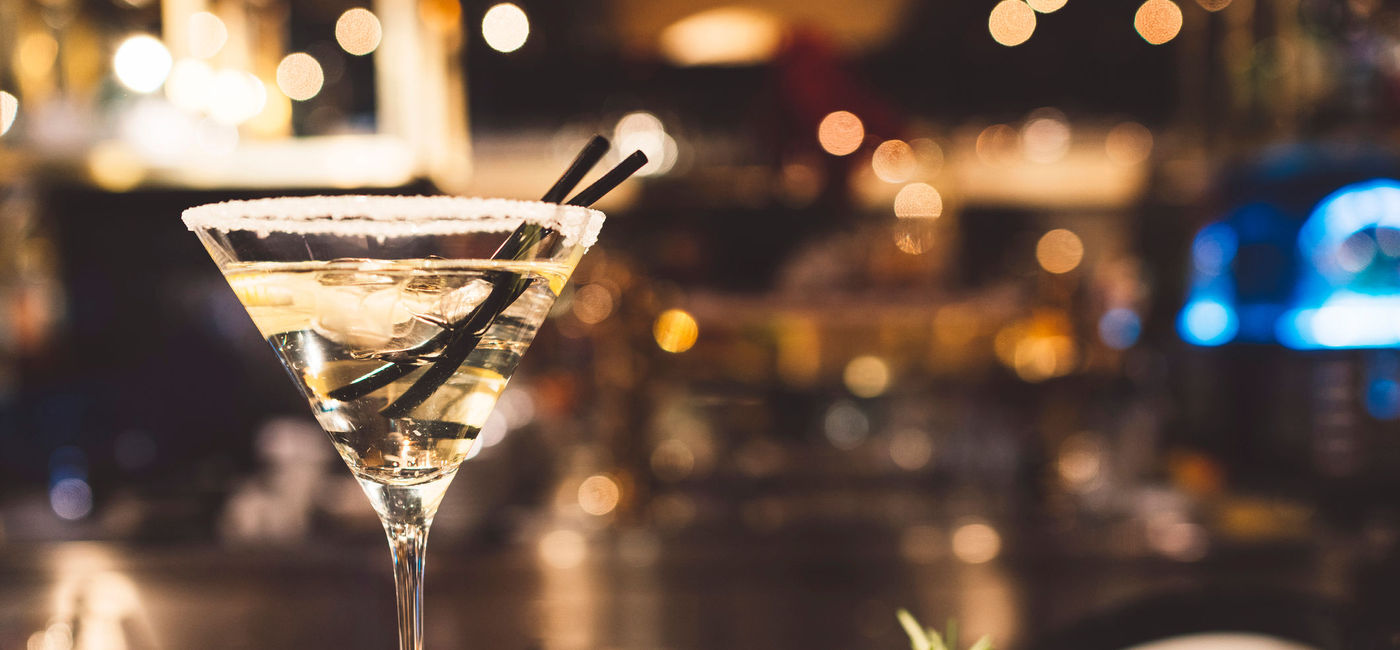 Image: Martini glass at bar (photo via Ziga Plahutar / GettyImages)