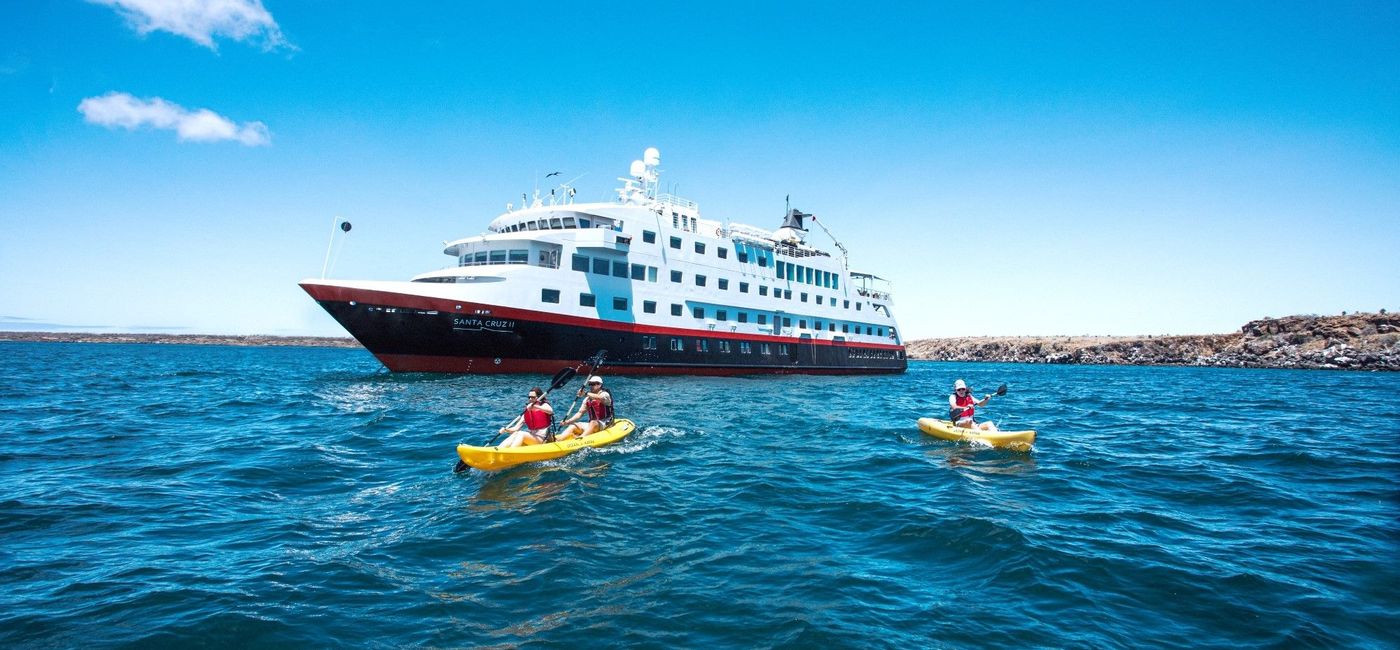 Image: Guests kayaking from the MS Santa Cruz II. (photo via Hurtigruten Expeditions) (Photo Credit: (photo via Hurtigruten Expeditions))