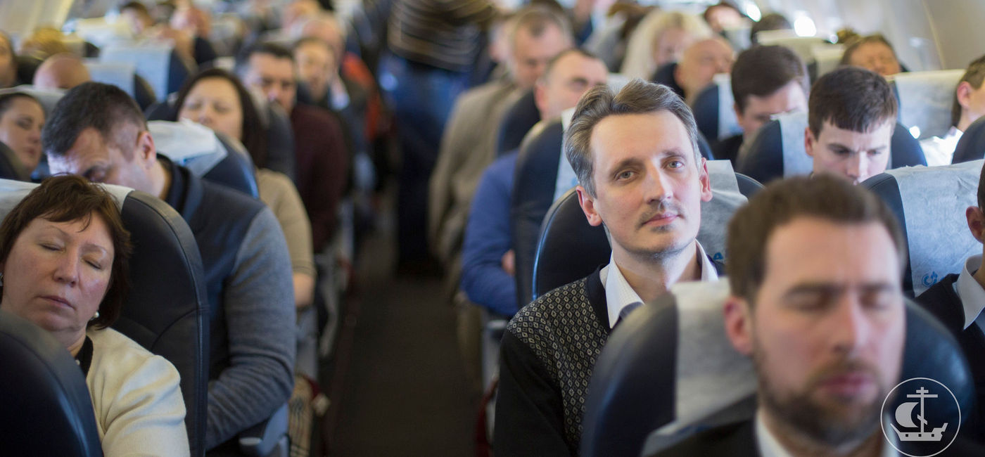 Image: Des passagers en vol. (PHOTO: Flickr/Saint-Petersburg Theological Academy)