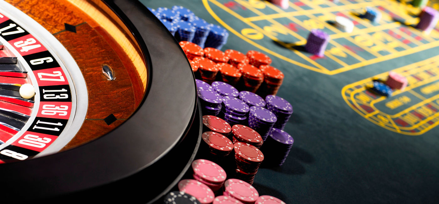 Image: Gambling chips on gaming table. (photo via Michael Blann/Royalty-free)