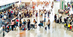 Crowd of travelers waiting for check-in