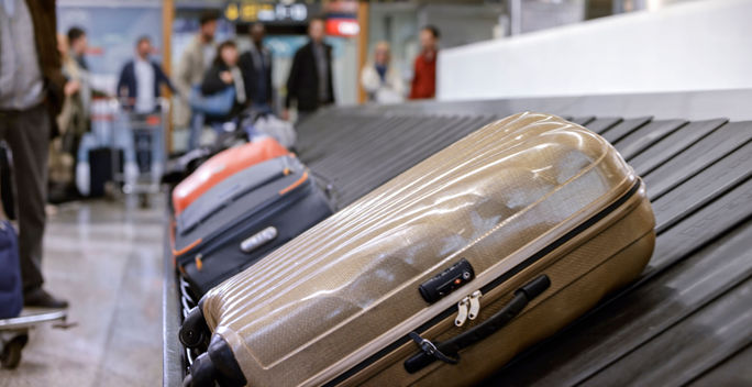 Business people standing at baggage claim. airport, baggage, claim