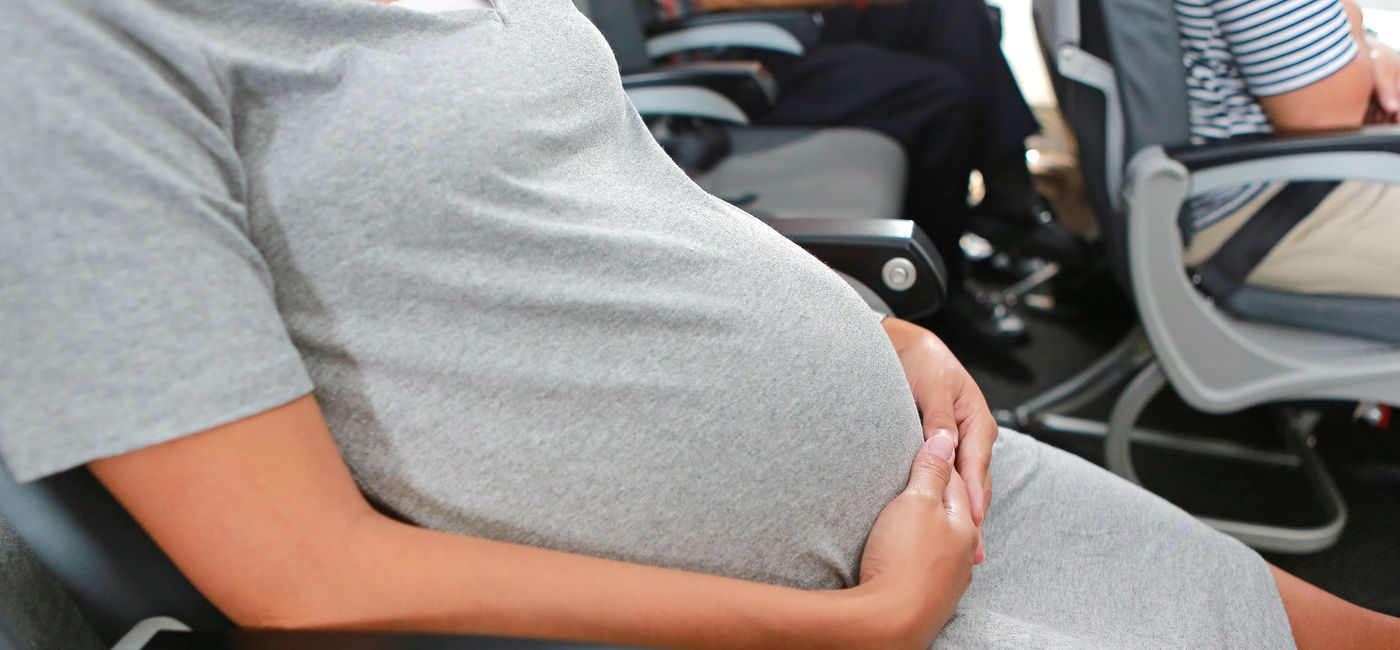 Image: PHOTO: Pregnant woman traveling by plane. (Photo via Getty Images Plus / iStock / GOLFX)