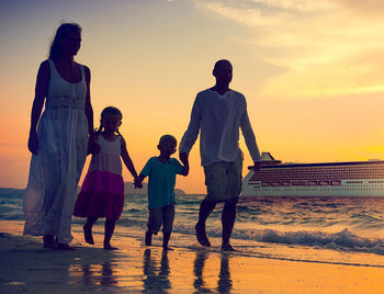 PHOTO: Family Children Beach Cruise Ship Relaxation Concept (photo via Rawpixel / iStock / Getty Images Plus)