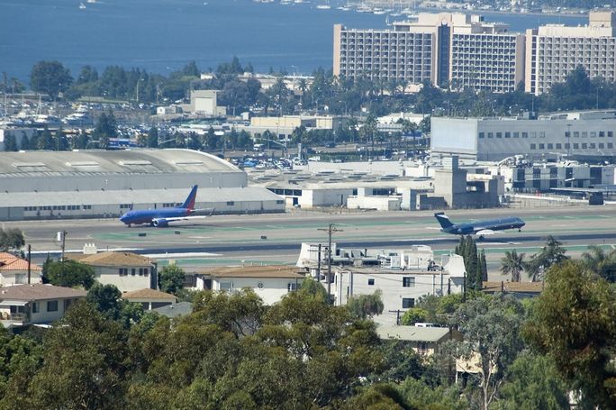 Planes landing and taking off at San Diego International Airport