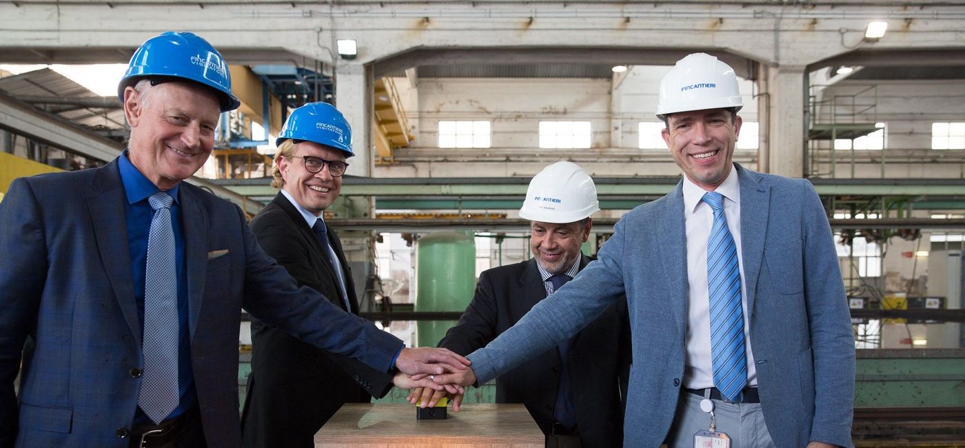 Image: PHOTO: Windstar Cruises’ Vice President of Expansion Projects John Gunner and Vice President of Fleet Operations Christopher Prelog, with Fincantieri’s Shipyard Director Salvatore Savarese and Vice President of Ship Repair and Conversions Andrew Toso in Palermo, Italy. (left to right) (photo via Windstar Cruises)