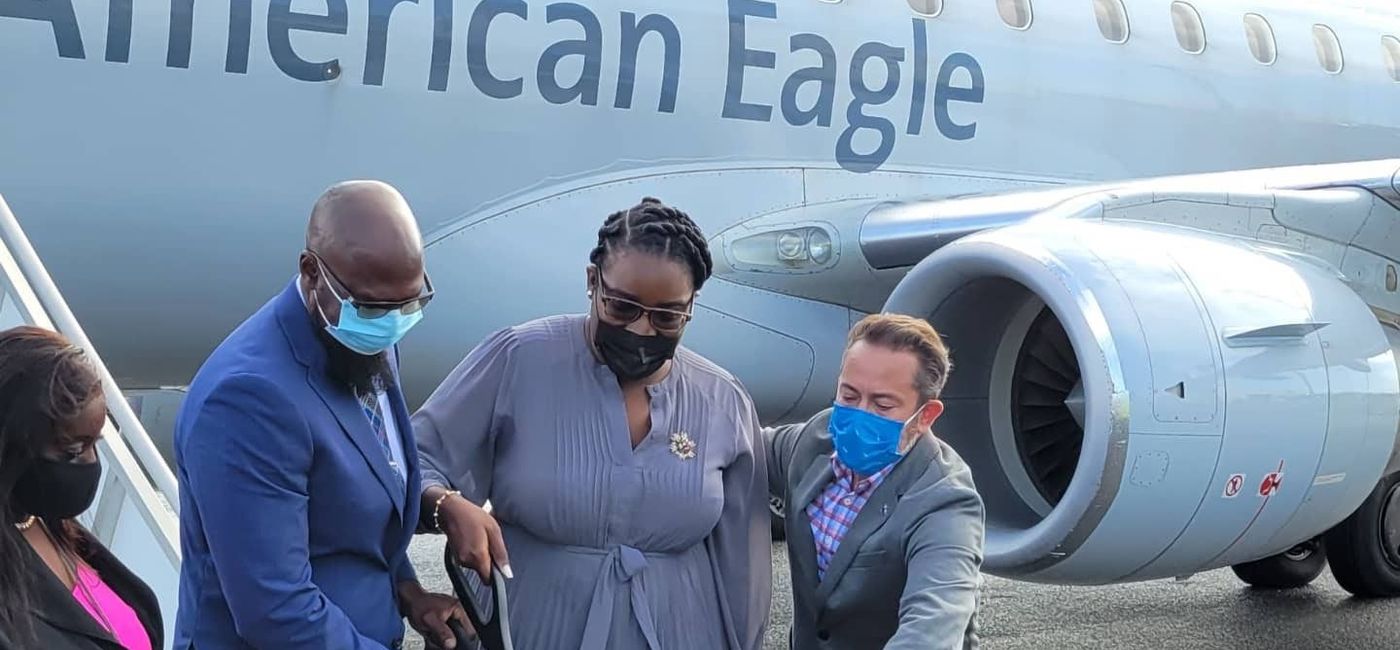 Image: Anguilla officials welcome AA flight (photo by Brian Major)