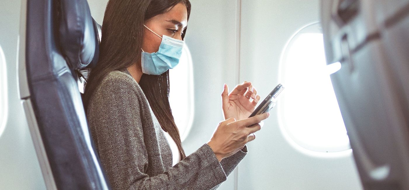 Image: A woman using Delta's WiFi. (photo via Delta Air Lines) (Delta)