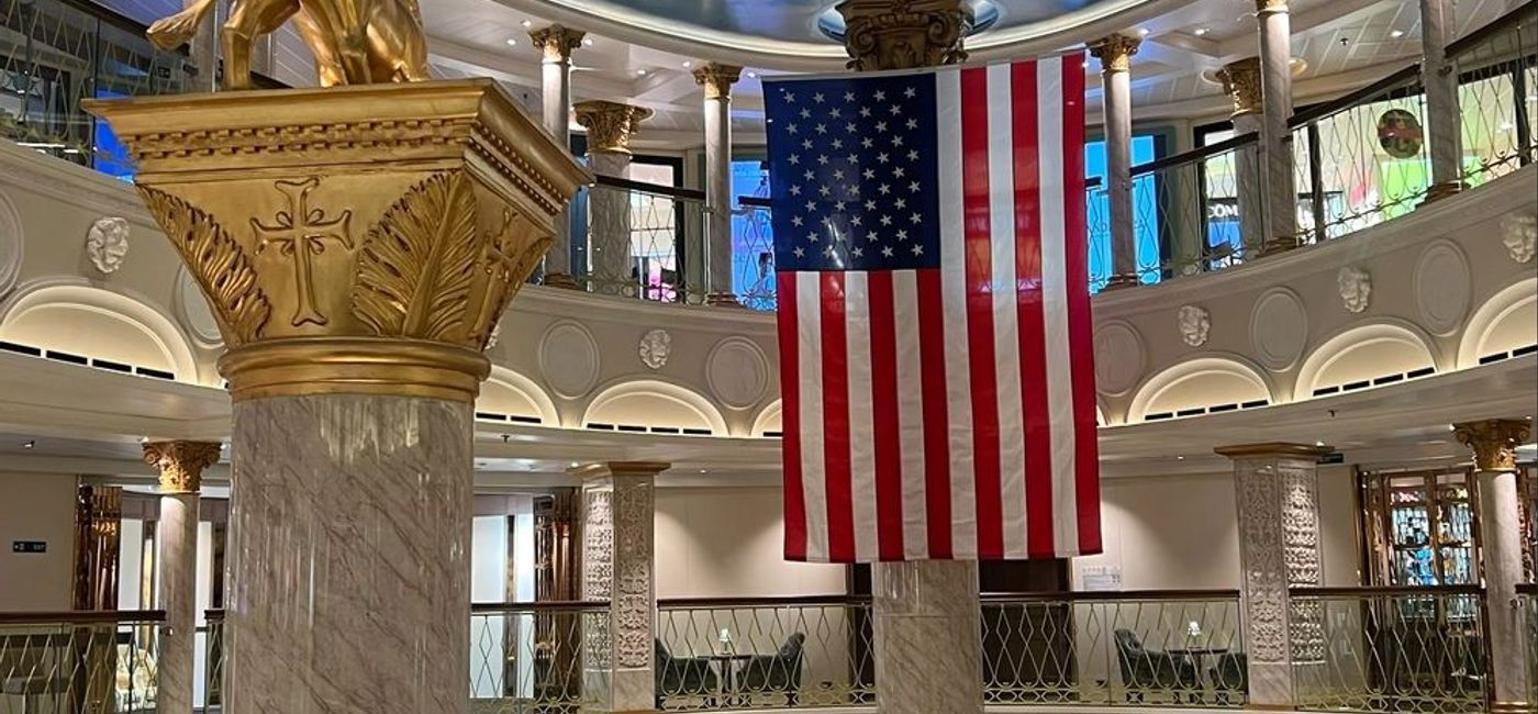 Image: American flag in Carnival Venezia atrium. (Photo Credit: Carnival Cruise Line Media)