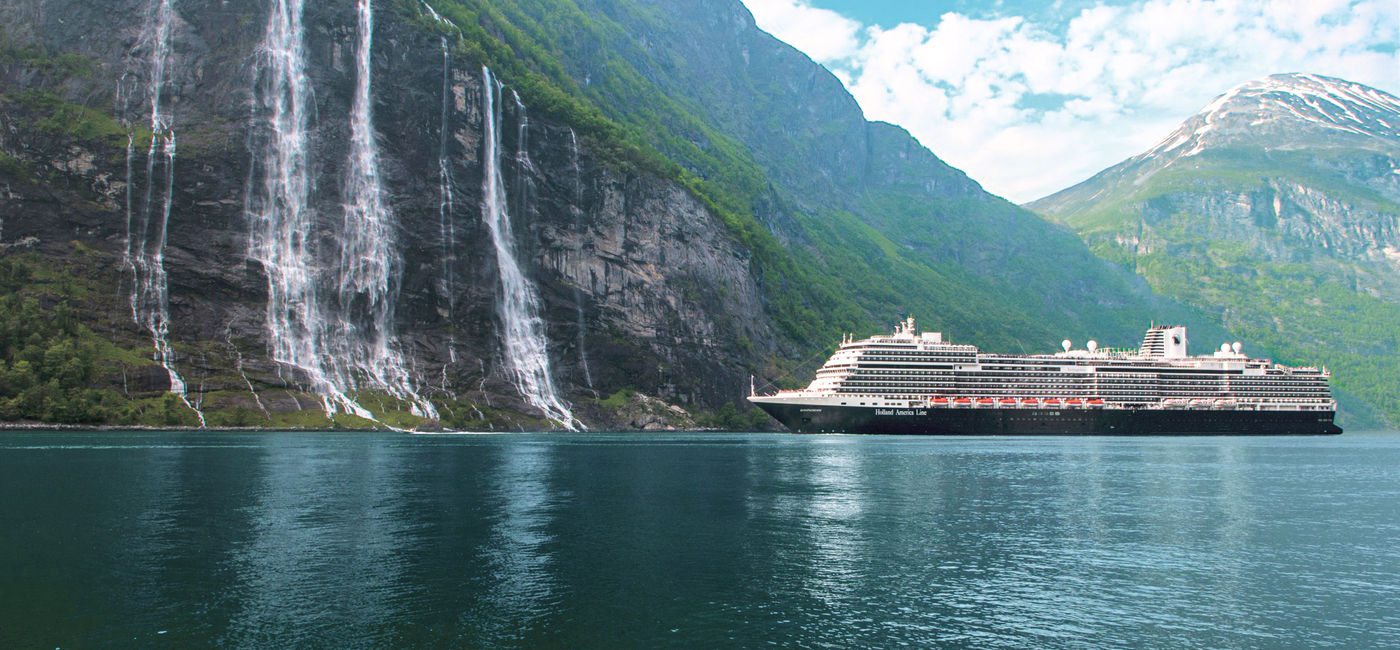 Image: Holland America Line’s Koningsdam in Geiranger, Norway. (Photo Credit: Holland America Line)