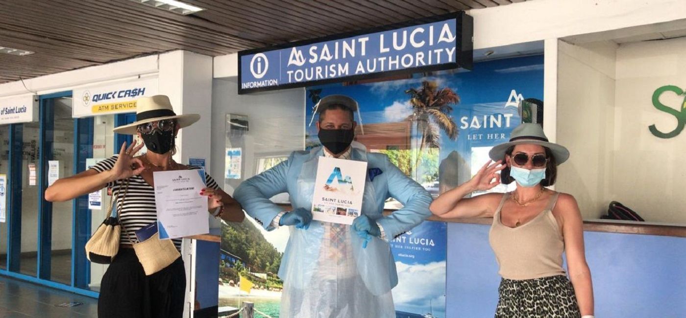 Image: PHOTO: First flight prize winners in Saint Lucia. (photo via Saint Lucia Tourism Board)