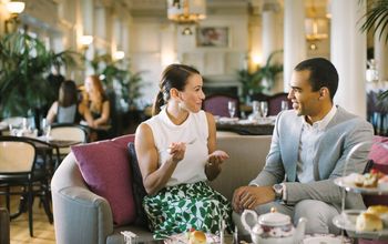 Couple enjoys tea in historic hotel tearoom