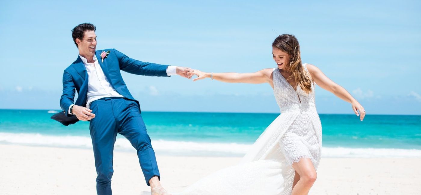 Image: Wedding couple on the beach. (photo via Hard Rock Hotels) (Hard Rock International)