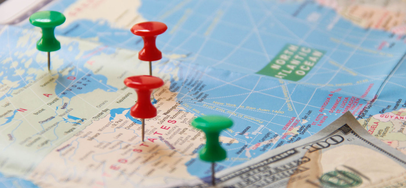 Image: Travel planning comes with a fee. (photo via iStock / Getty Images Plus / crazydiva)