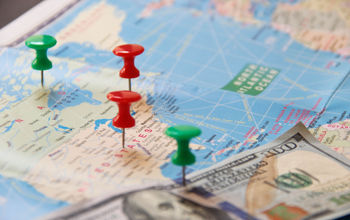 Money and a travel map.