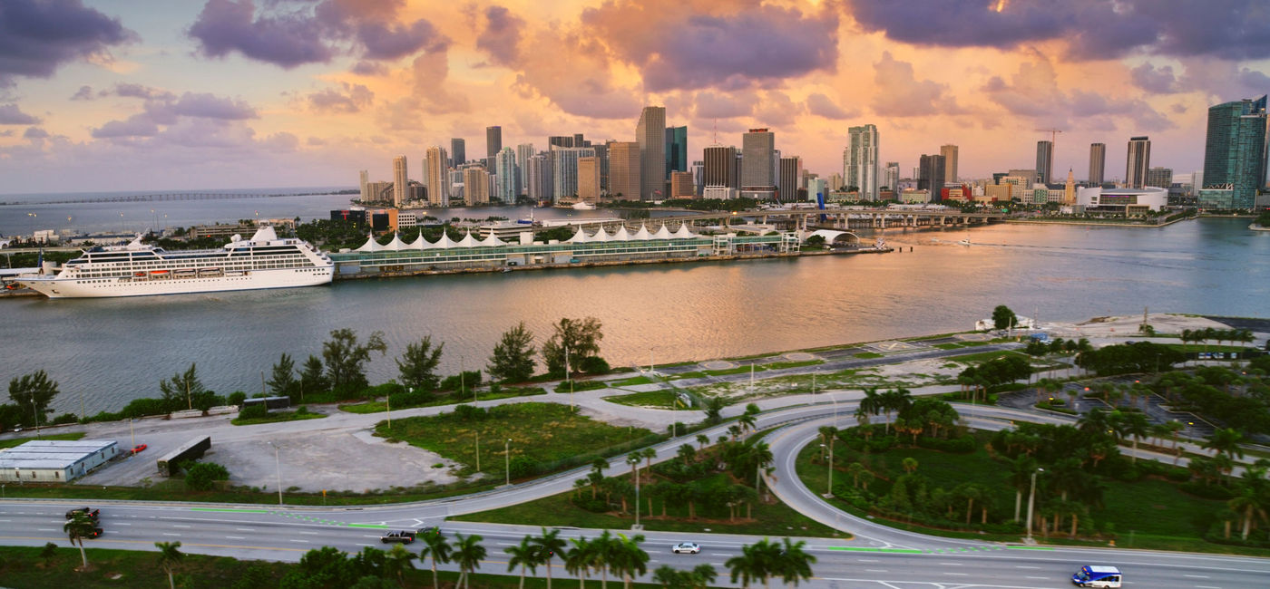 Image: PortMiami with a cruise ship docked. (photo via iStock/Getty Images E+/simonkr)