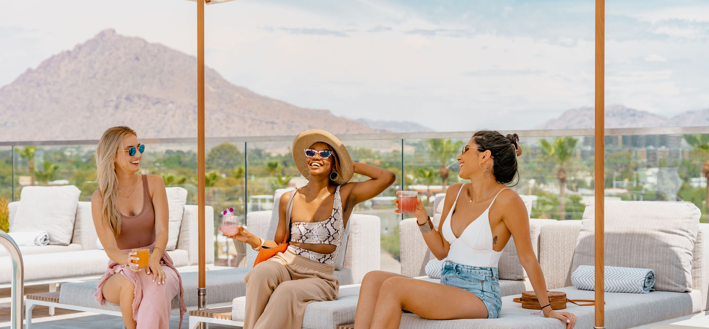 Image: Friends reconnect at the Canopy by Hilton Scottsdale Old Town. (photo via Hilton) ((photo via Hilton))