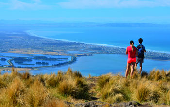 Couple look at the landscape view of Christchurch, New Zealand