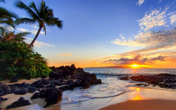 Makena Secret Beach at sunset in Maui, Hawaii.
