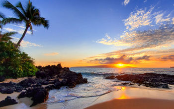 Makena Secret Beach at sunset in Maui, Hawaii.