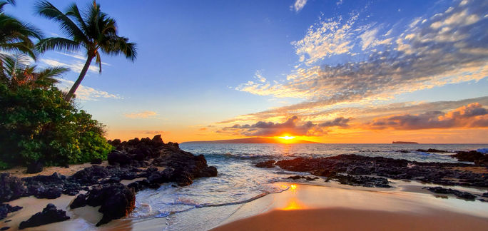 Makena Secret Beach at sunset in Maui, Hawaii. Makena Secret Beach at sunset in Maui, Hawaii.