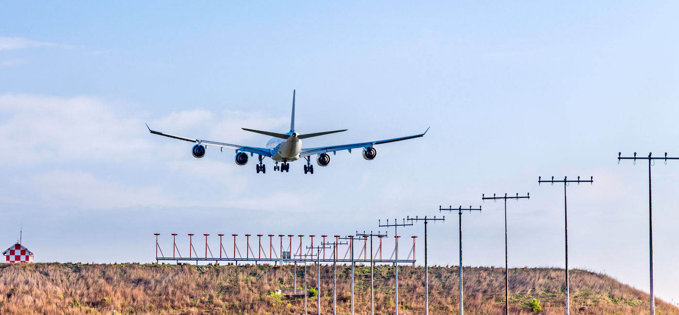Image: Plane landing at O.R. Tambo International Airport in Johannesburg. (photo via THEGIFT777 / iStock / Getty Images Plus)