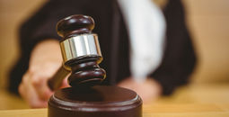 Judge with gavel.
