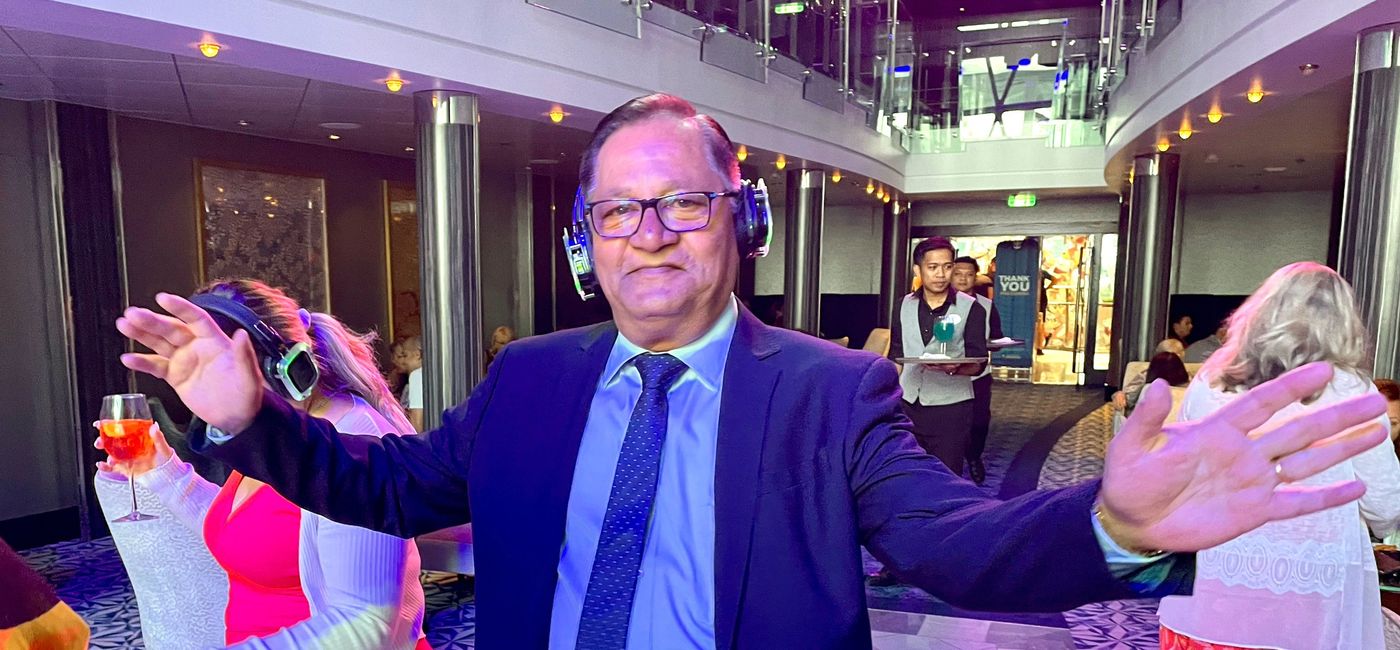 Image: Centre Holidays co-founder Carlton Montaut dances during a silent disco during the Air Canada Vacations Seminar at Sea aboard Royal Caribbean's Symphony of the Seas. (Bruce Parkinson)