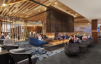 Fireplace and natural wood bring the comfort of home into the DCA Admirals Club.