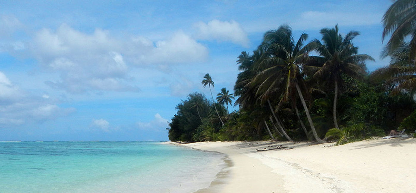 Image: PHOTO: Palm Grove's Beach, in Vaimaaga, Rarotonga, Cook Islands. (Photo via Flickr/Robert Linsdell)