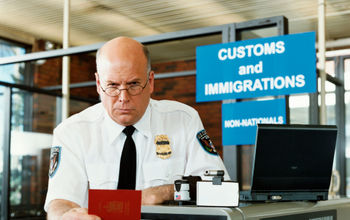 An airport Customs and Border Protection agent.