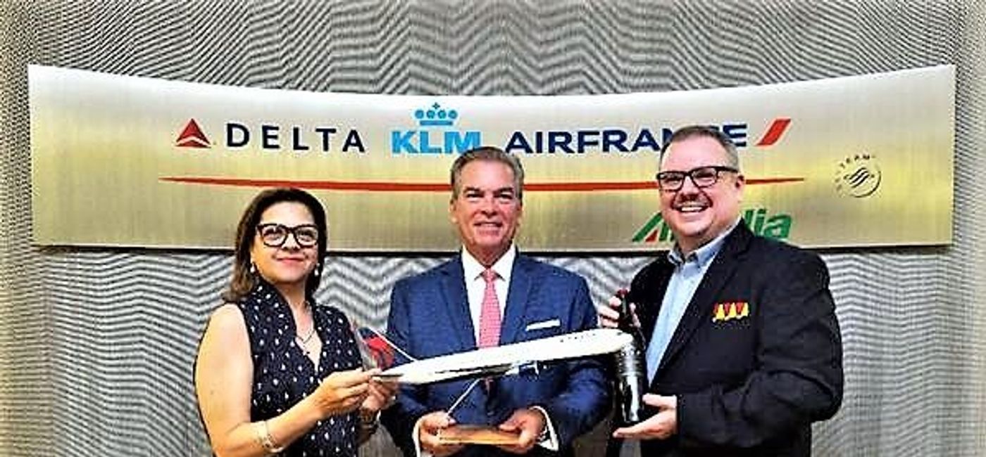 Image: The South African Tourism North America team including Judy Pillay, Manager of Stakeholder Relations (L) and Justin Barnette, Head of Marketing & Communications (R), celebrate with Delta’s Chuck Imhof, Vice President New York & Sales. (photo via South African Tourism)