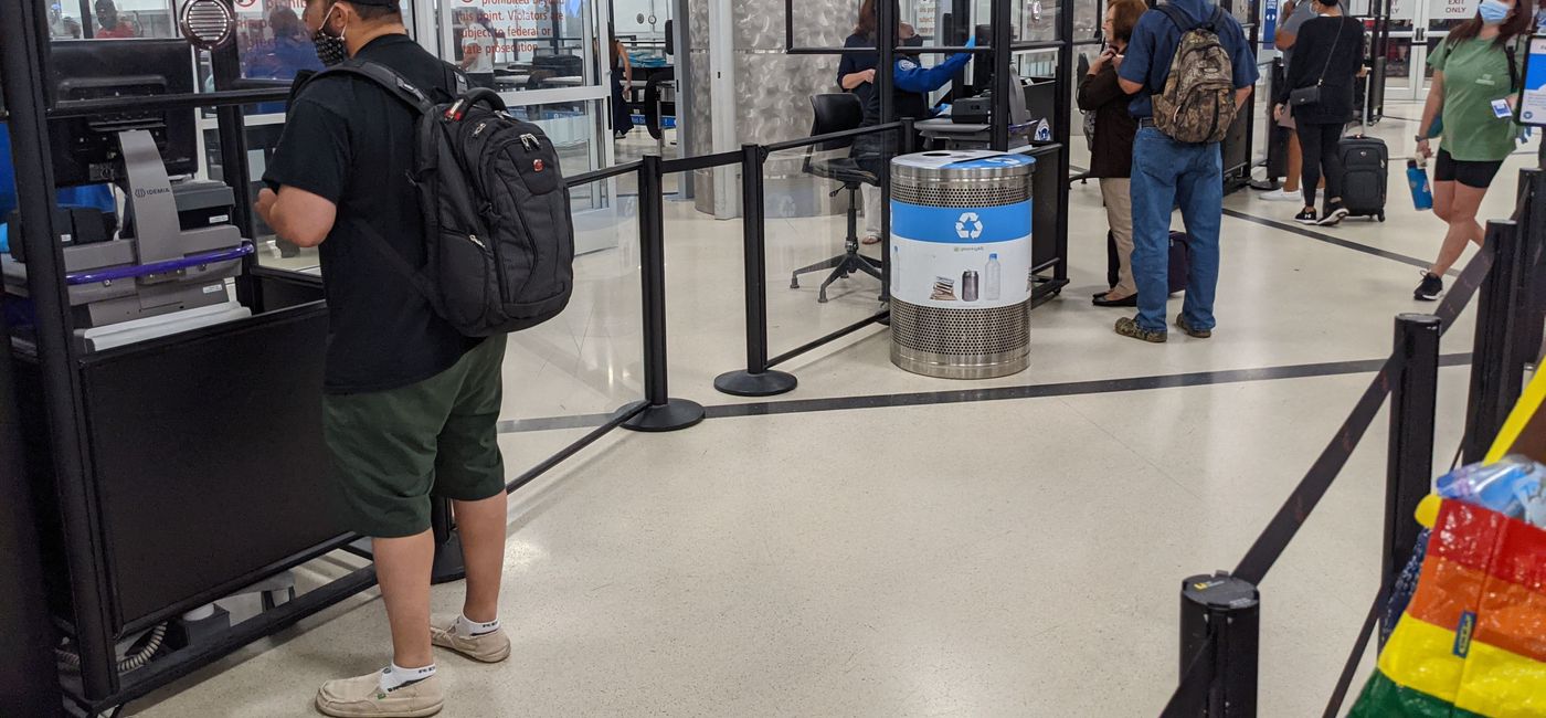 Image: Travelers check in with TSA agents during COVID-19 pandemic (photo by Eric Bowman)