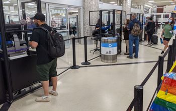 Travelers at TSA security