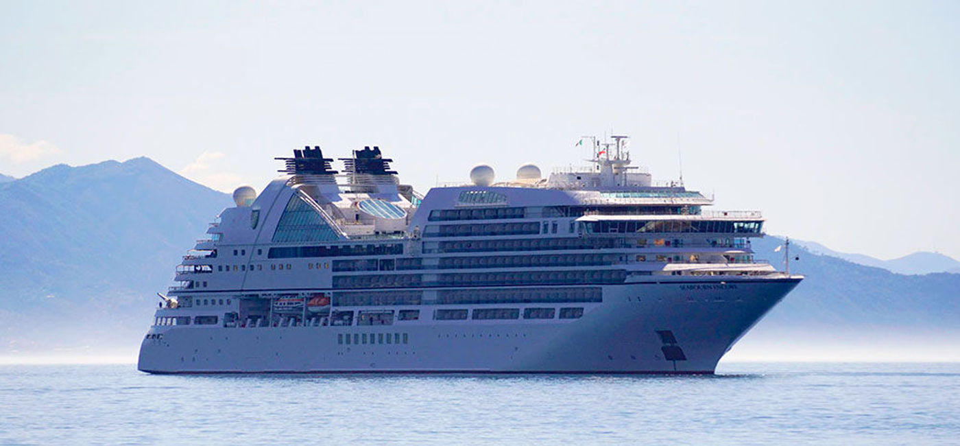 Image: PHOTO: Seabourn's luxurious Seabourn Encore anchored off shore. (photo by Jason Leppert)