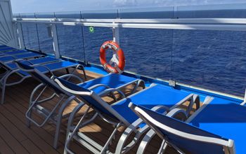 Cruise ship chairs overlooking ocean