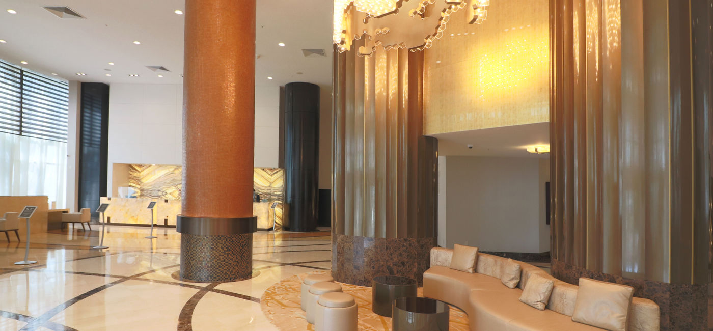 Image: PHOTO: A honeycomb-patterned chandelier hangs above the main seating area providing a sophisticated and striking new look. (photo via Trump International Beach Resort)