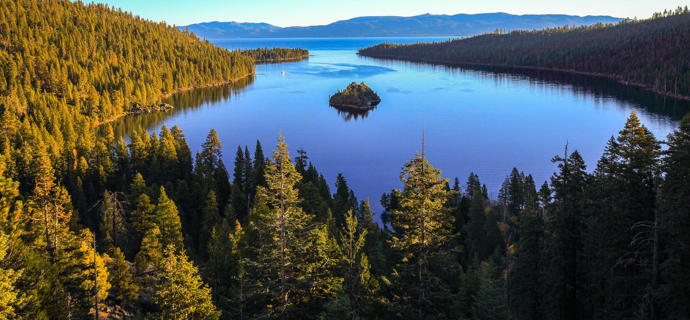 Image: PHOTO: Autumn sunrise over Emerald Bay, Lake Tahoe, California. (photo via 4nadia/iStock/Getty Images Plus)