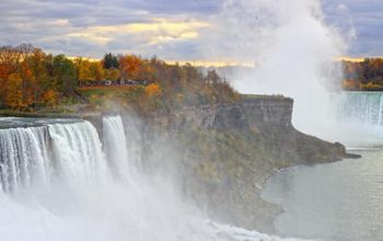 Beautiful fall colors on the cliff of American Falls of Niagara Falls on the New York side