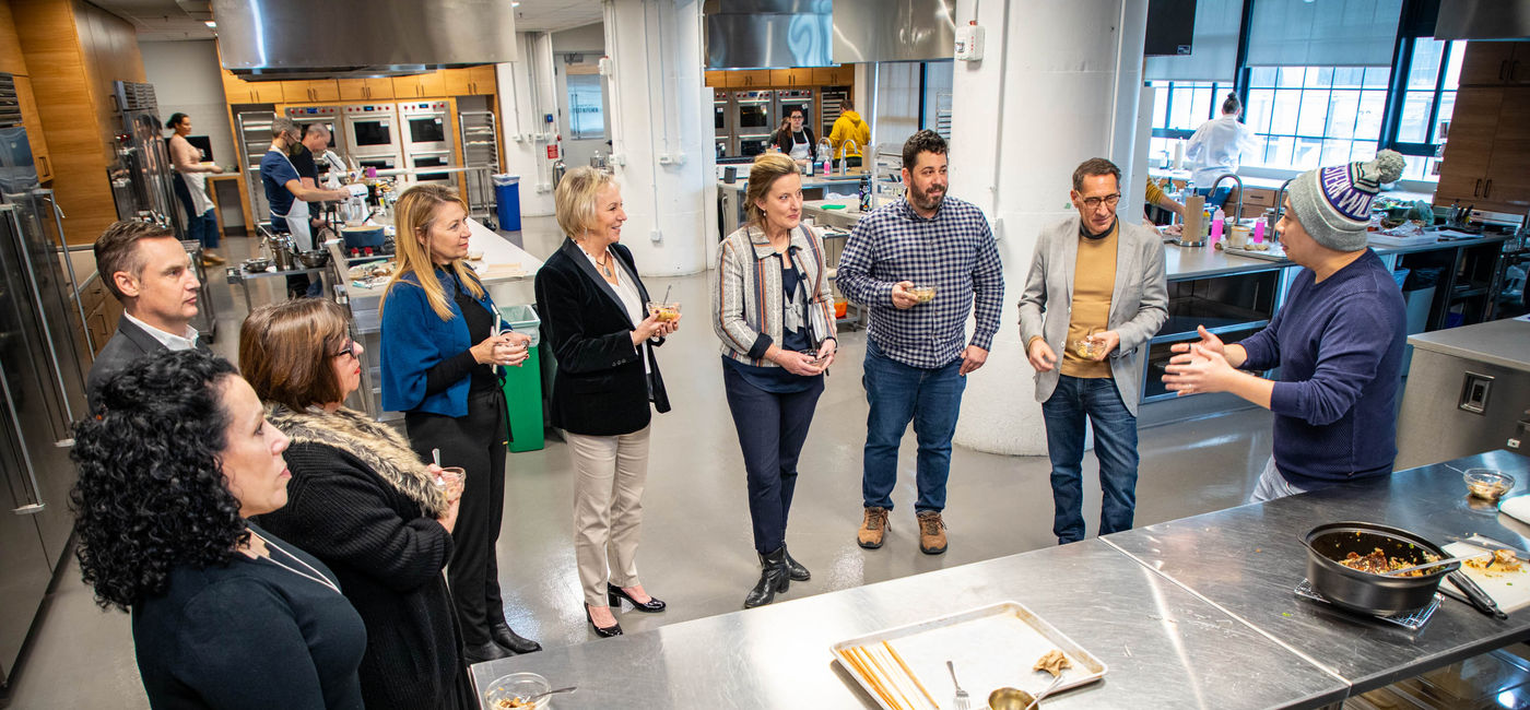 Image: Representatives from American Queen Voyages and America's Test Kitchen enjoy a tasting at  America's Test Kitchen. (photo via American Queen Voyages) ((photo via American Queen Voyages))