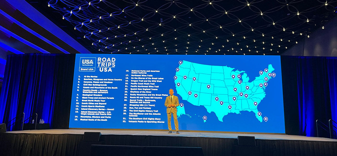 Image: Brand USA President and CEO Chris Thompson speaks at IPW. (Photo Credit: Paul Heney)